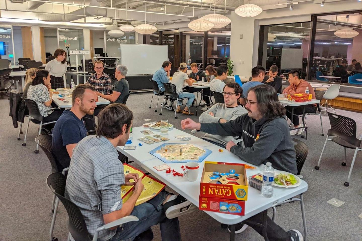 Employees playing board games in an office