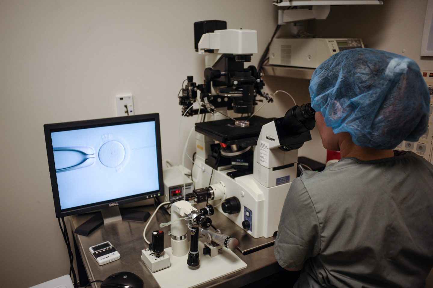 An embryologist at work at the Virginia Center for Reproductive Medicine in Reston, Va.