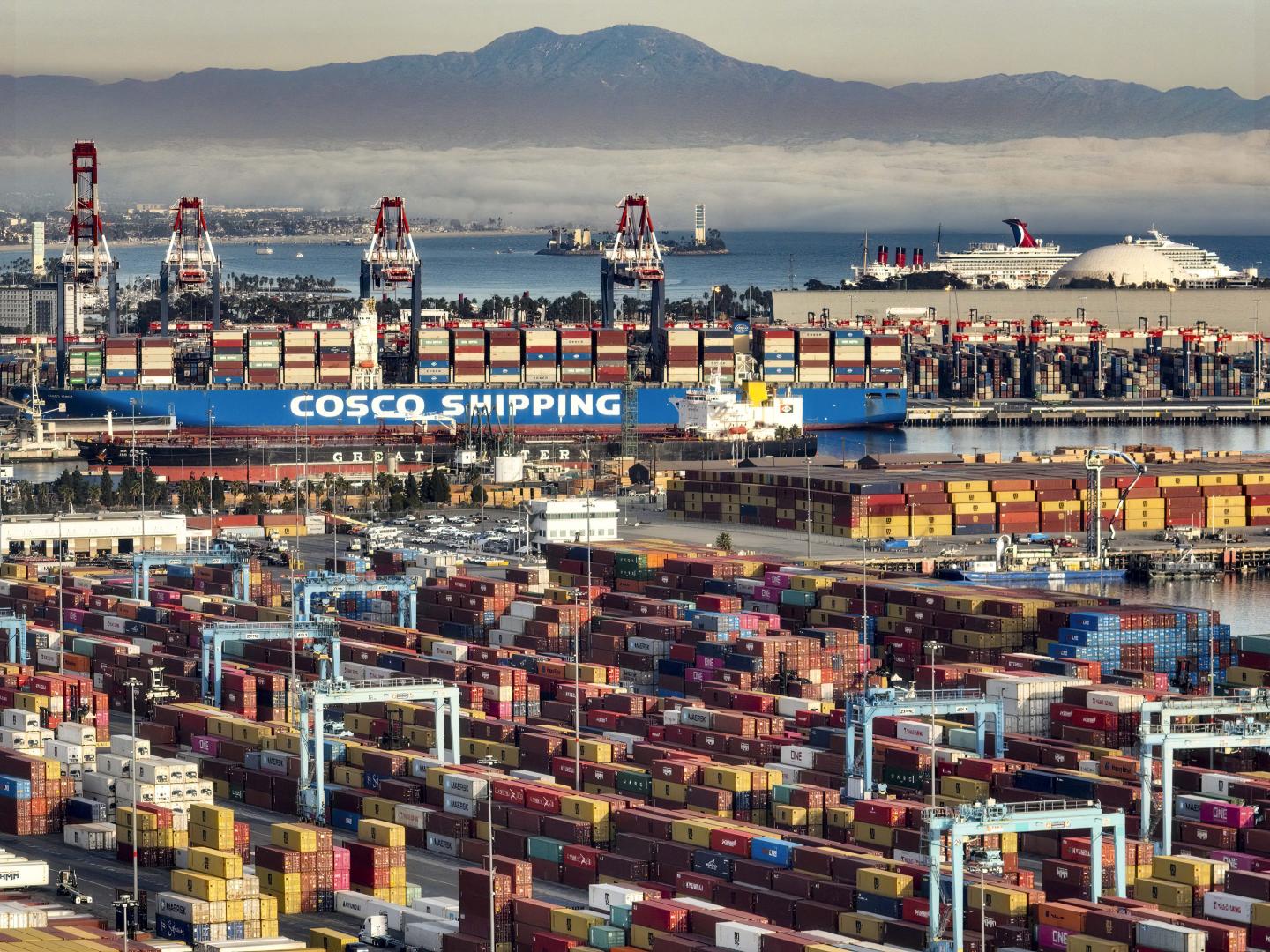 Containers are stacked up in the Port of Long Beach in California