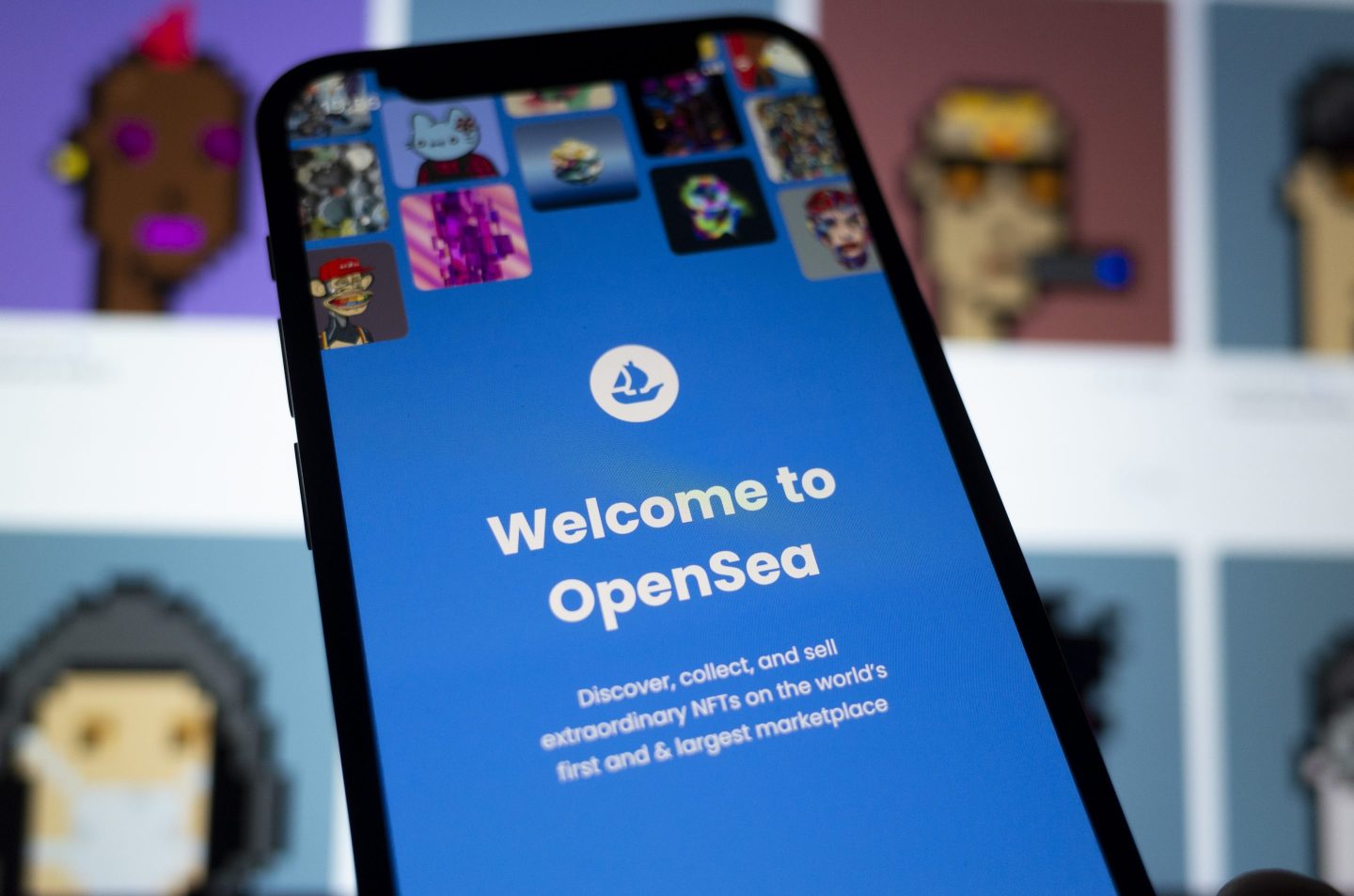 Phone with OpenSea logo