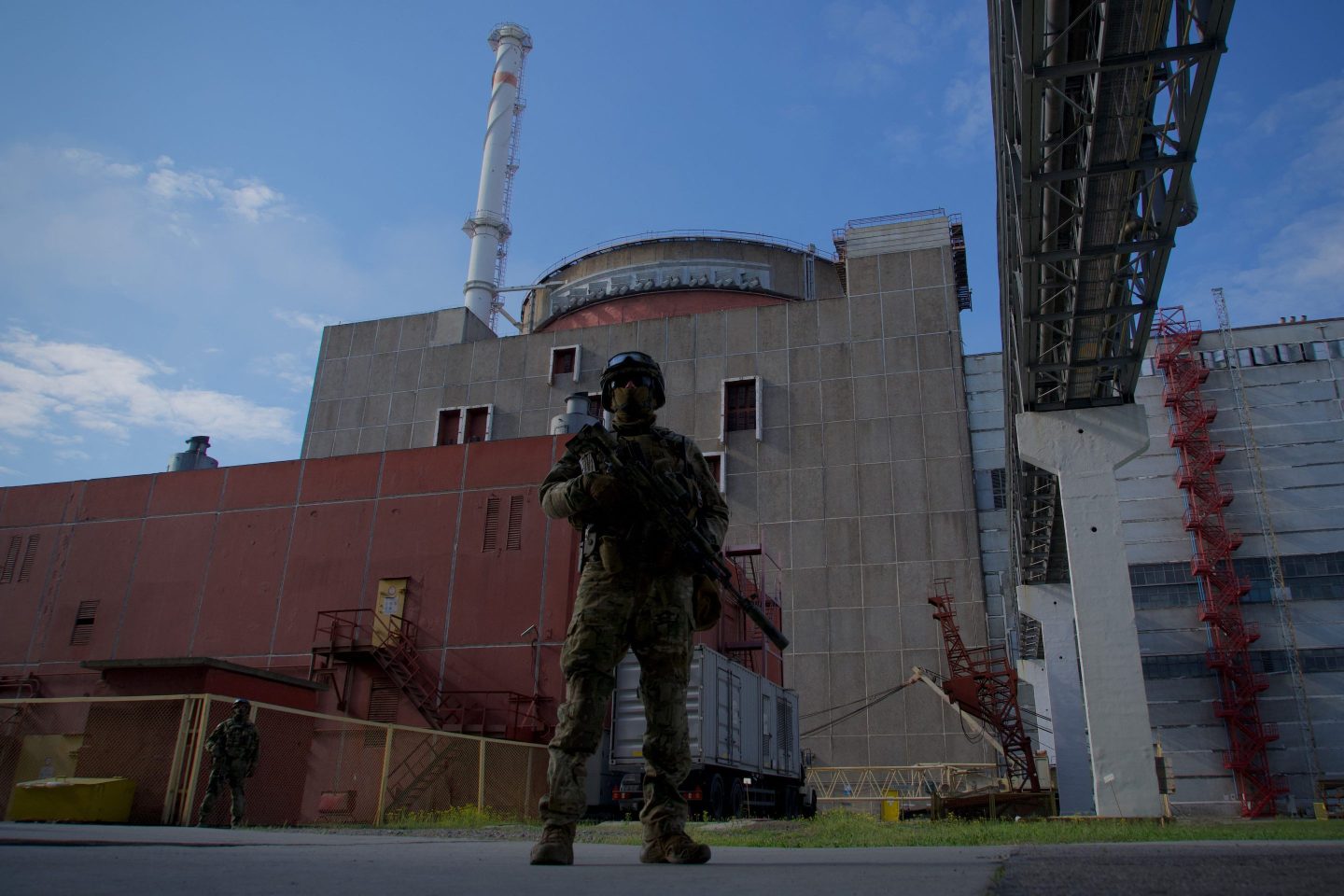 A Russian serviceman stands guard outside the Zaporizhzhia nuclear power station in Energodar, on May 1, 2022.