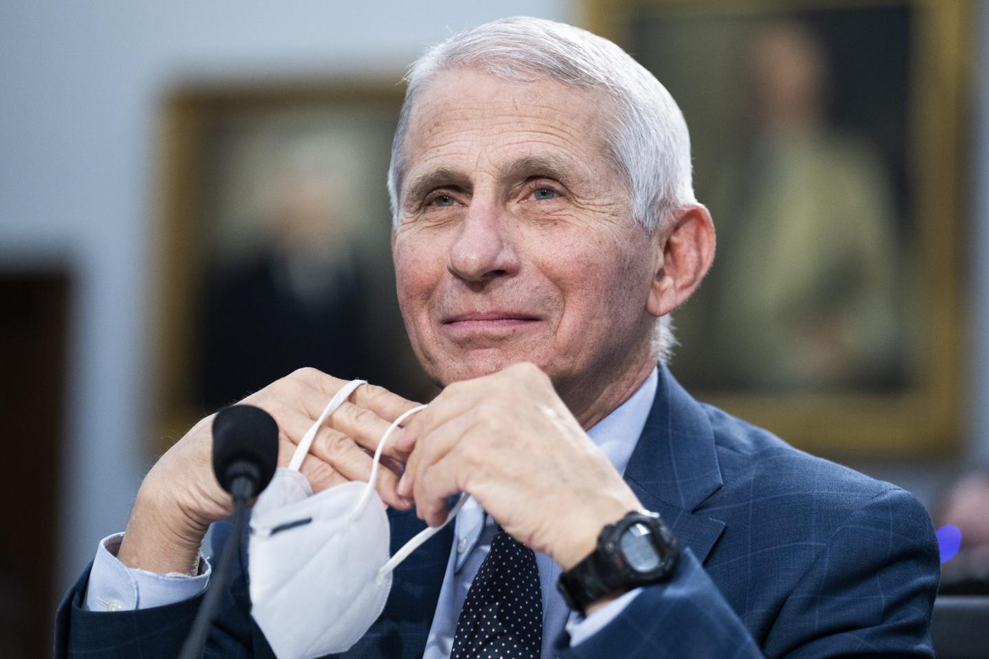 Dr. Anthony Fauci holding an N95 mask during a House Subcommittee meeting
