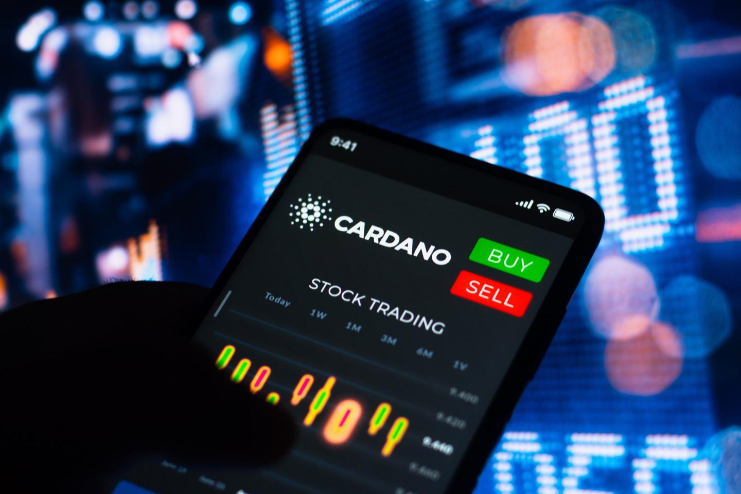 the stock trading graph of Cardano (ADA) seen on a smartphone screen