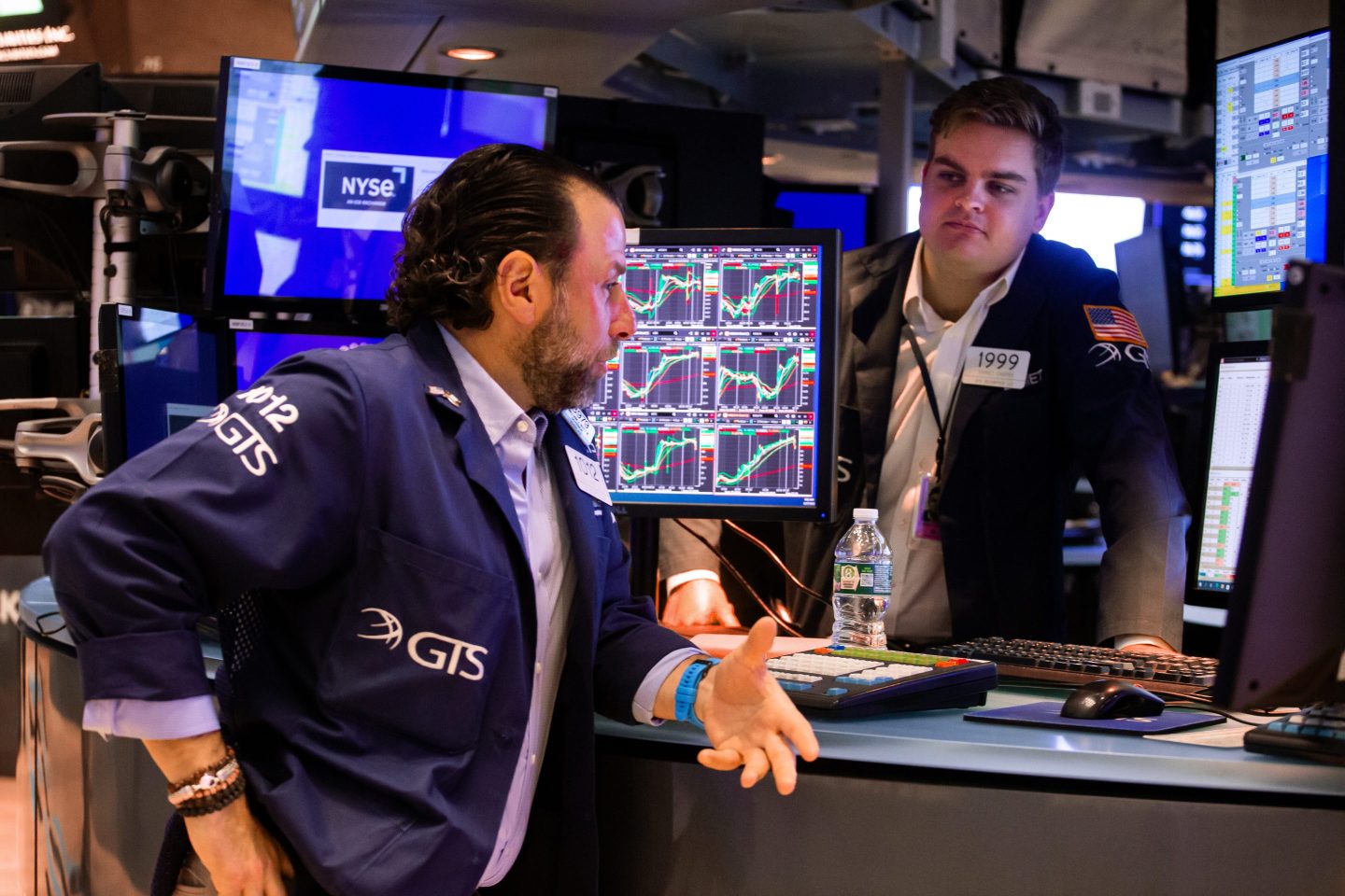 Traders work on the floor of the New York Stock Exchange