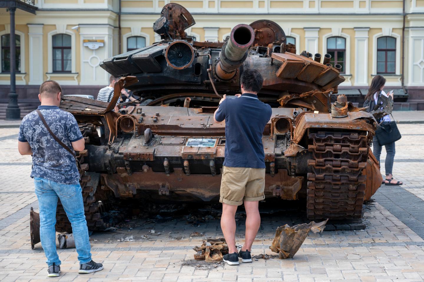 25 July 2022, Ukraine, Kiew: On Michael Square in the city center there are destroyed Russian military vehicles