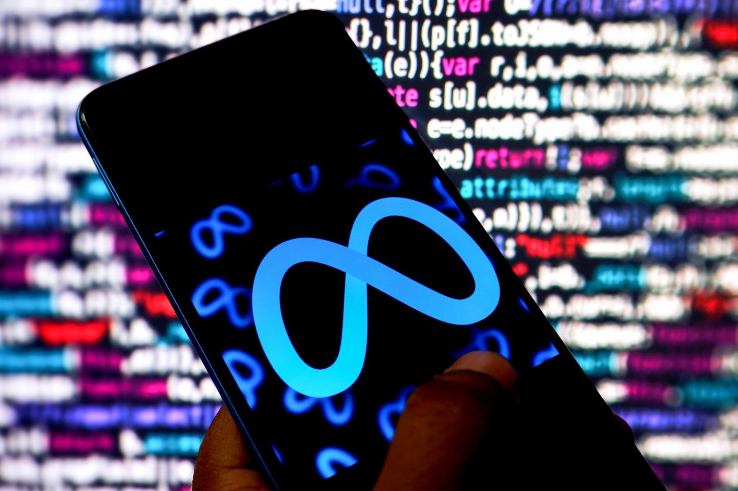 In this photo illustration, a Meta logo is displayed on a