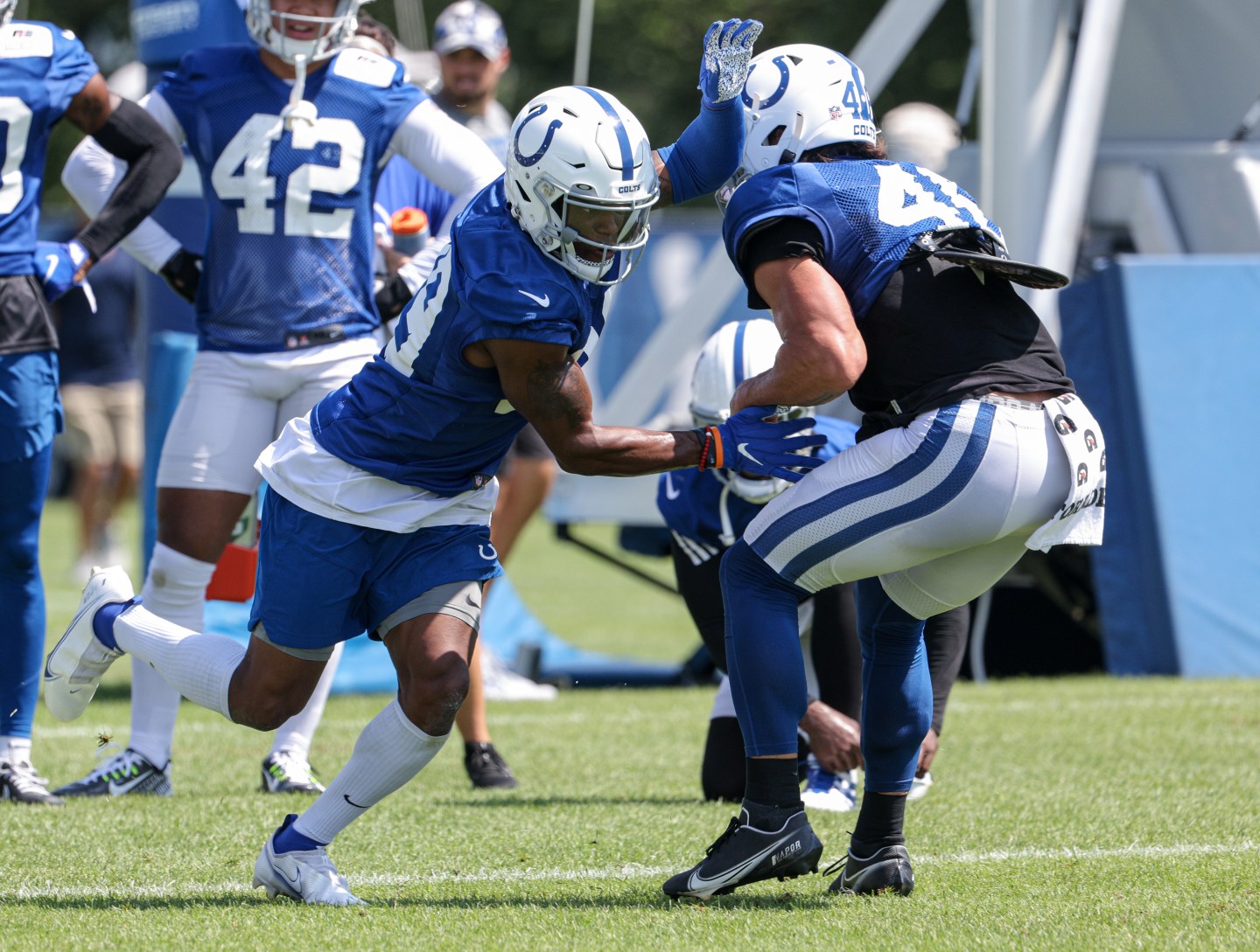 Football players practicing.