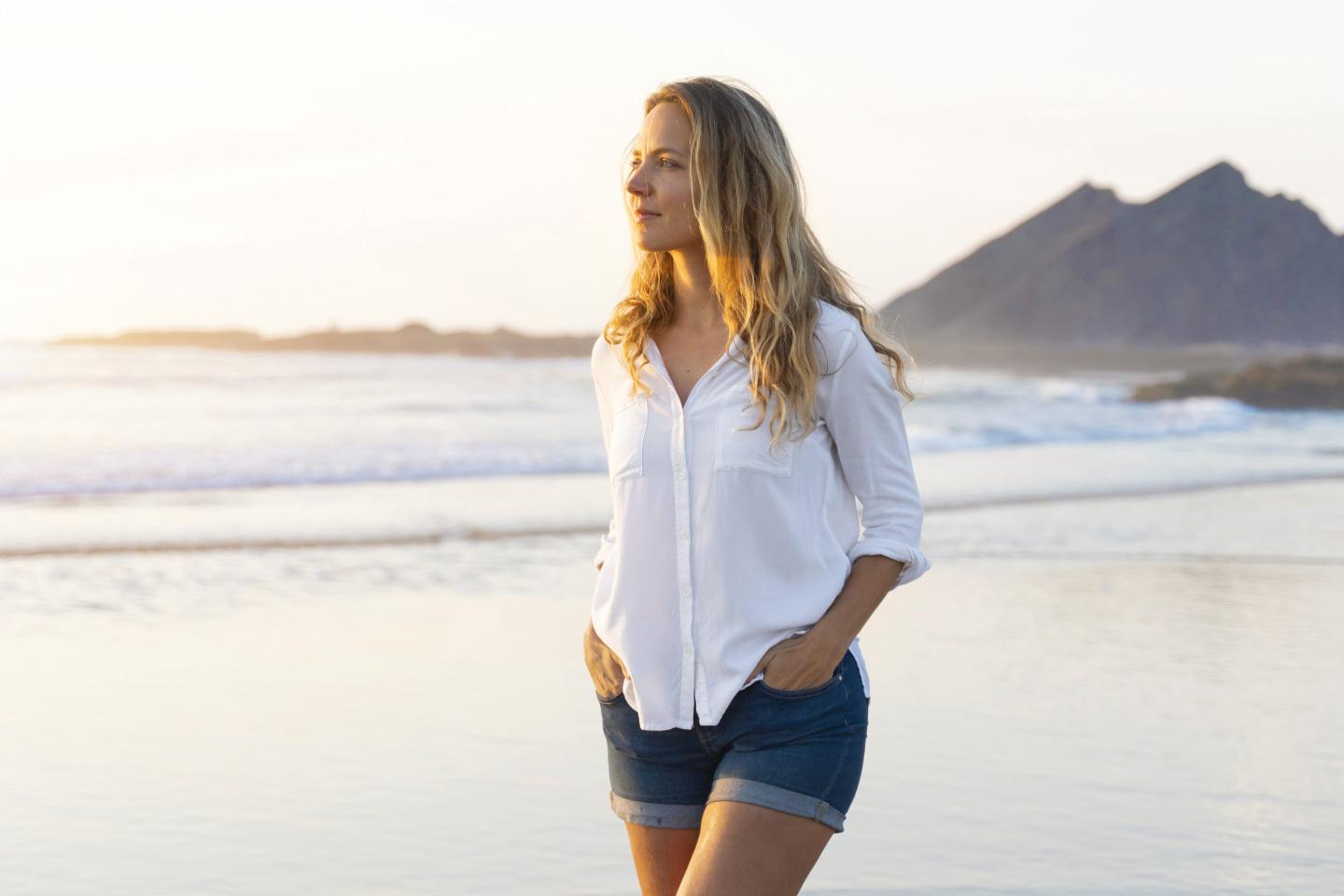 woman walking at beach