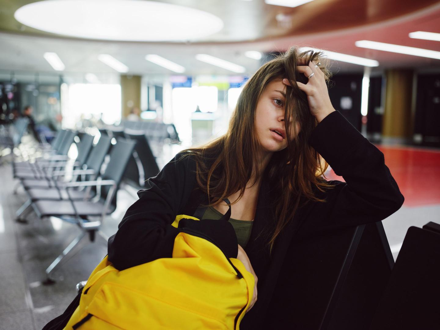 A frustrated traveler at an airport