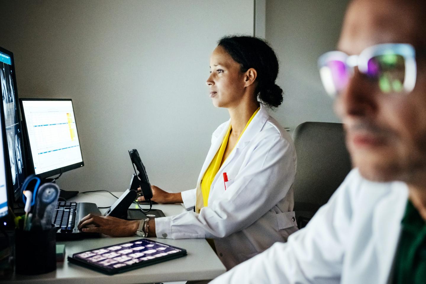 Doctors looking at x-ray results
