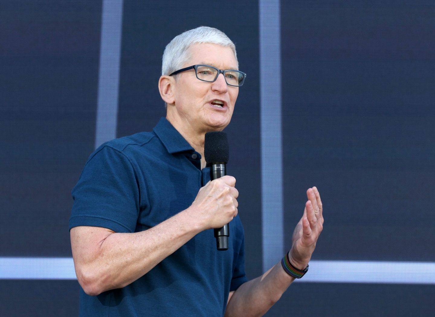 Apple CEO Tim Cook delivers a keynote address during the WWDC22 at Apple Park in June 2022