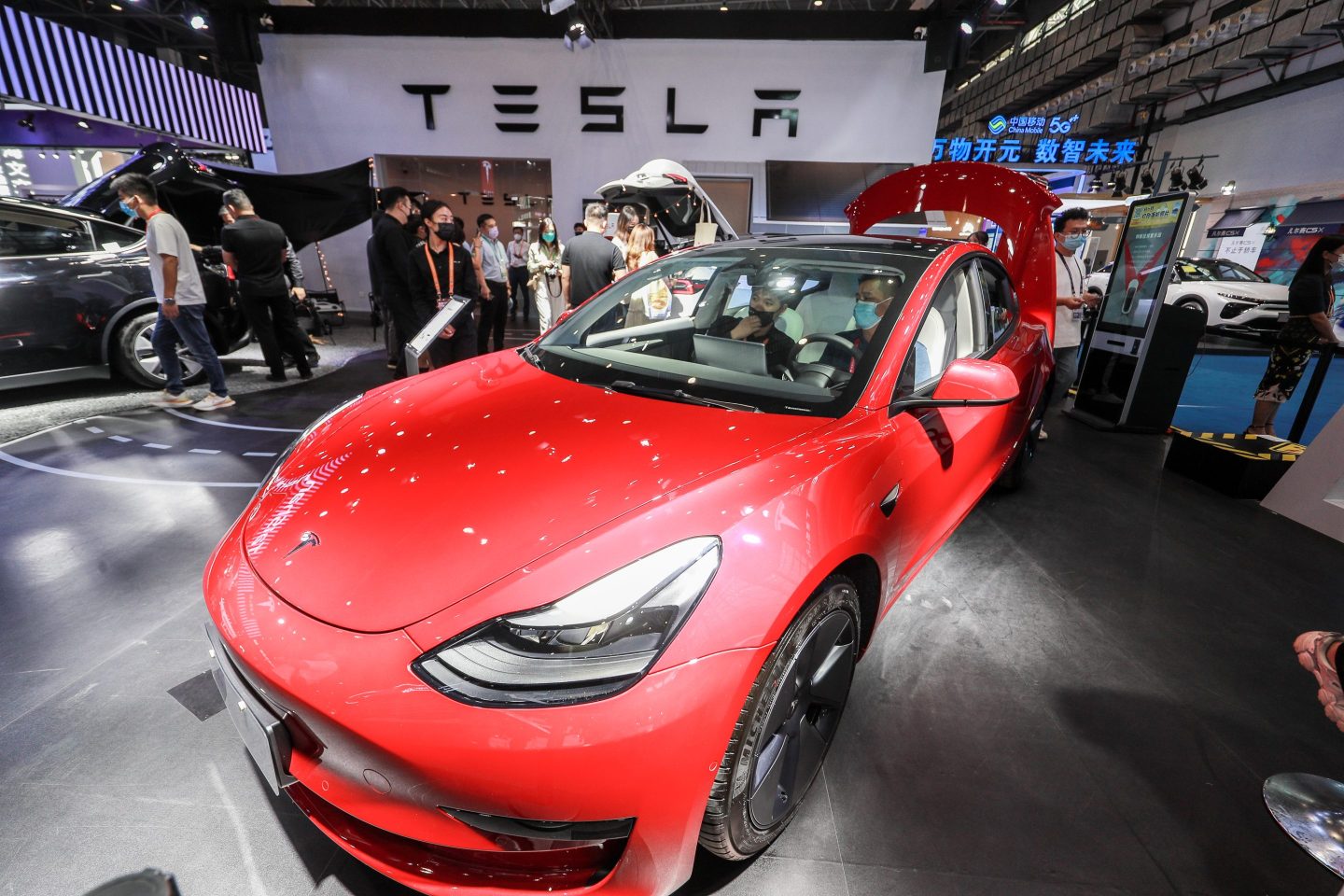 The Tesla exhibit at the China International Consumer Products Expo in July. Thursday, Tesla shareholders approved a stock split.