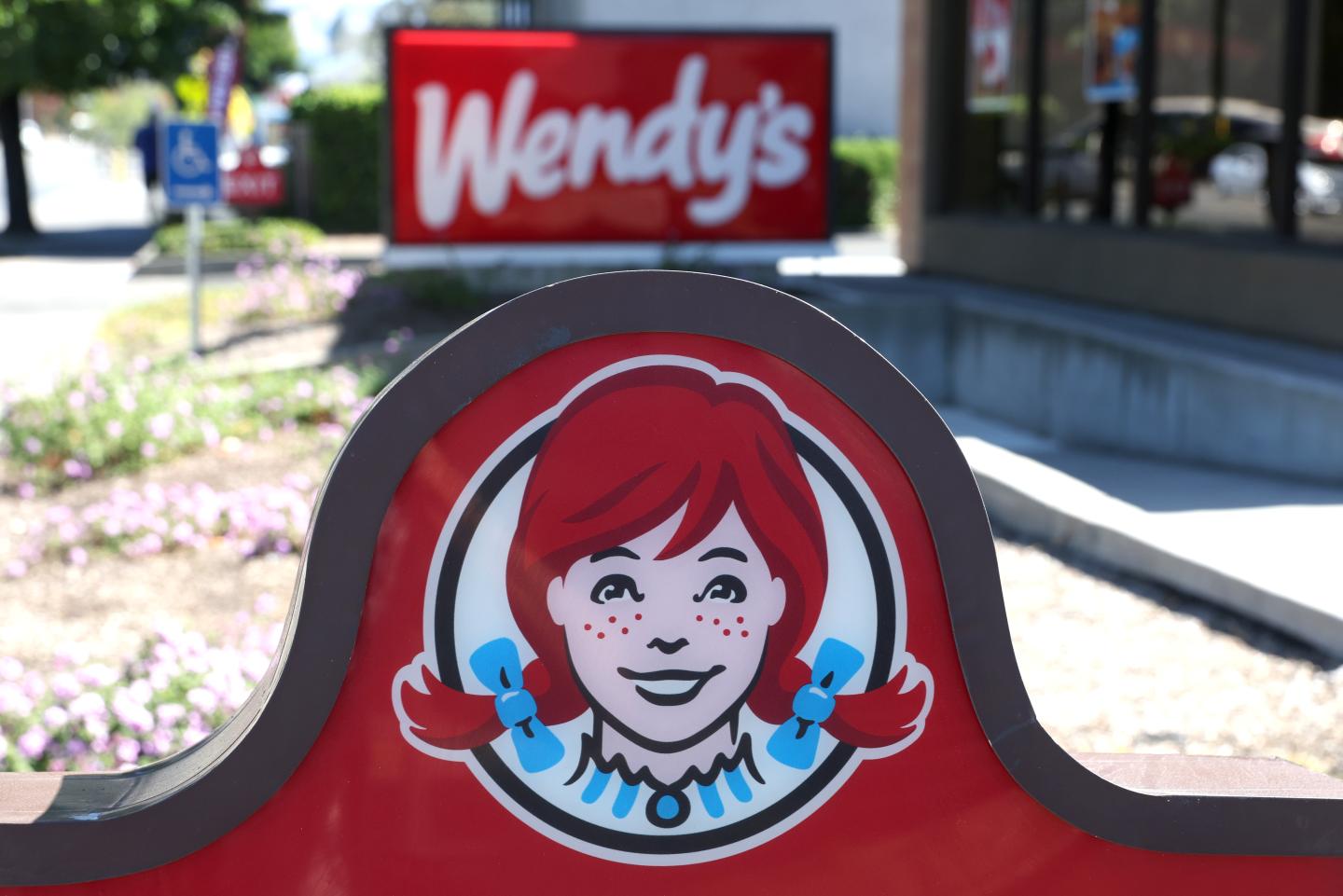 A sign in front of a Wendy’s restaurant on Aug. 10 in Petaluma, Calif.