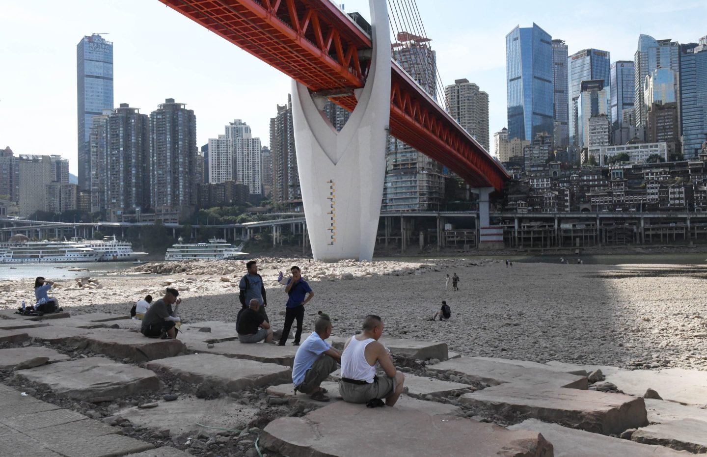 Drought is draining river beds in China as a heat wave forces power suppliers to ration energy supply.
