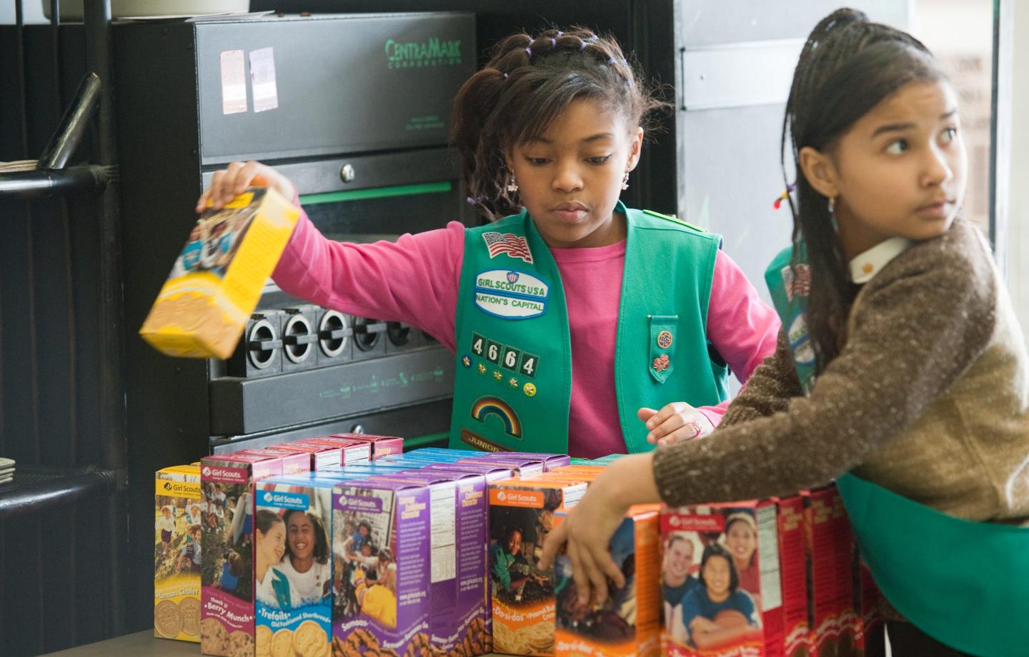 girl scouts sell cookies