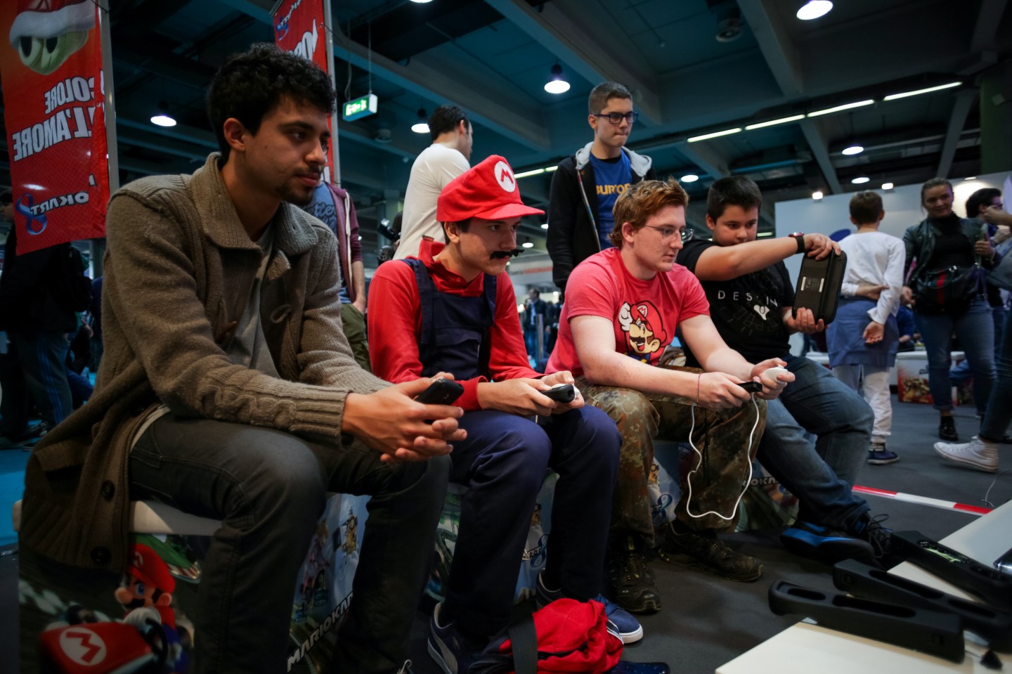 A group of young men playing video games