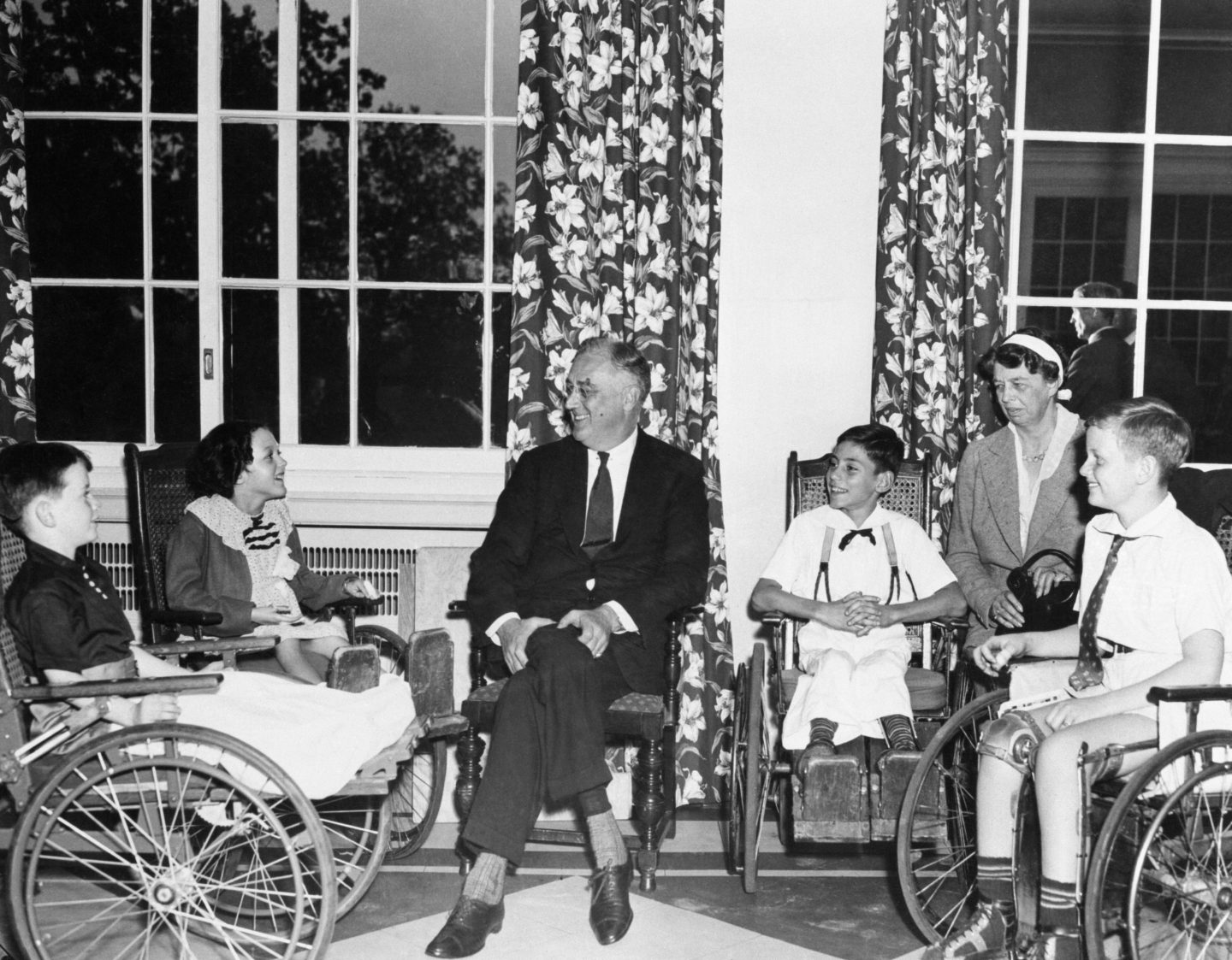 President and Mrs. Franklin Roosevelt enjoying after-luncheon conversation with young polio patients patients of the Warm Springs Foundation in Georgia sometime between 1933 and 1945, during which time he was president. He was diagnosed with polio in 1921 at age 39.