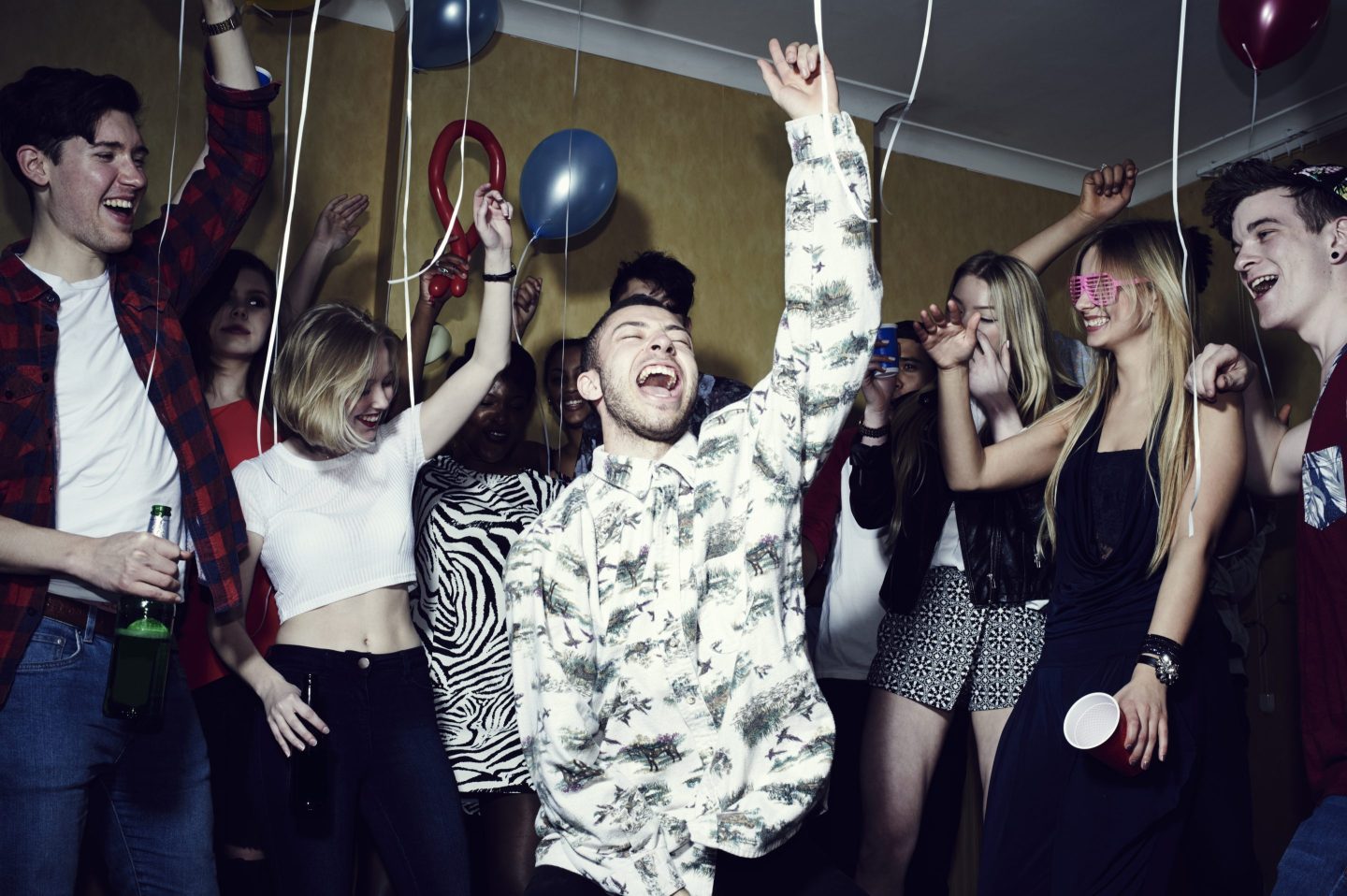 Group of friends having fun at a party