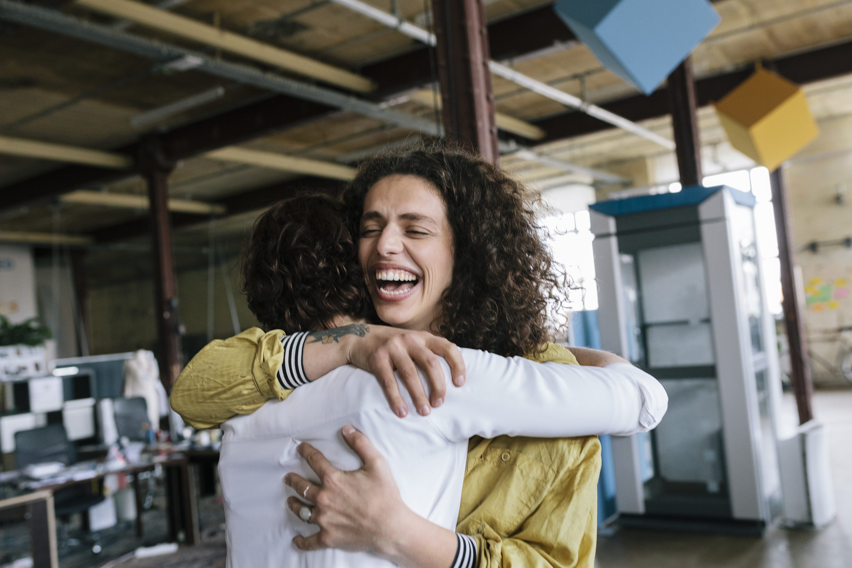Coworkers embracing