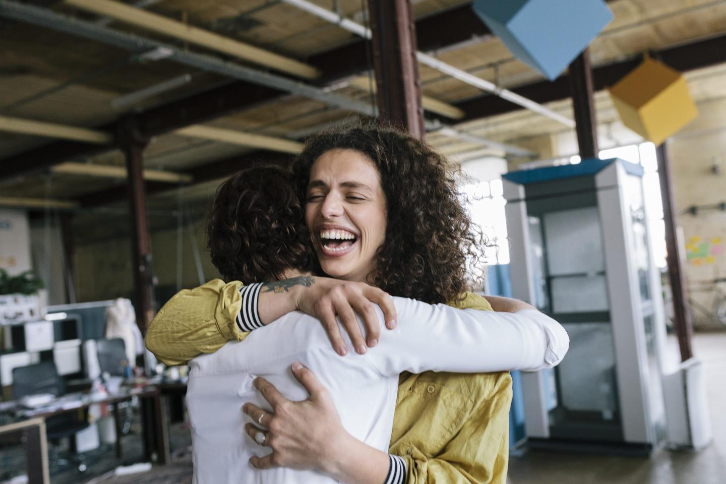Coworkers embracing