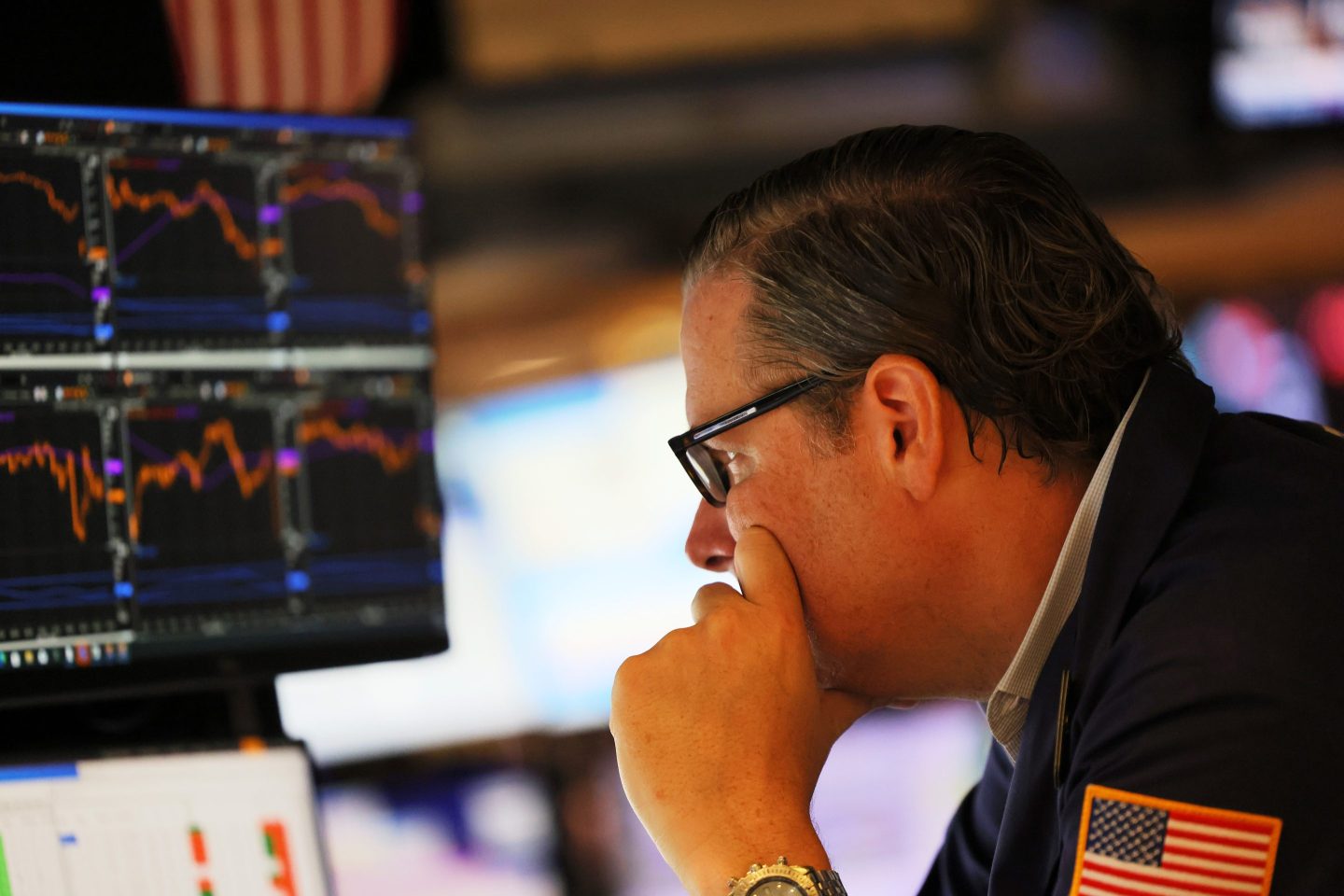 A trader works on the floor of the New York Stock Exchange.