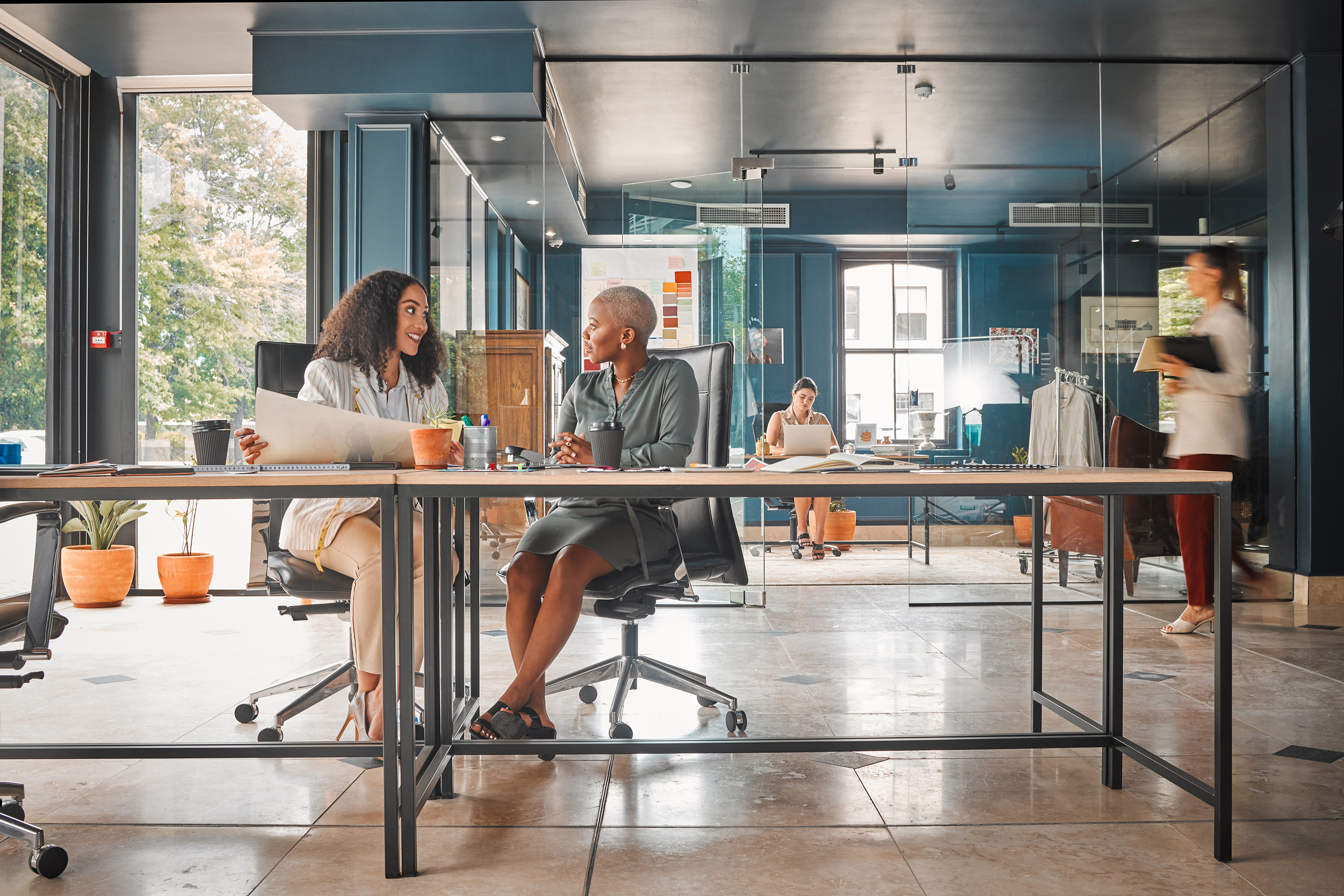 Shot of a group of female designers working in an office space.