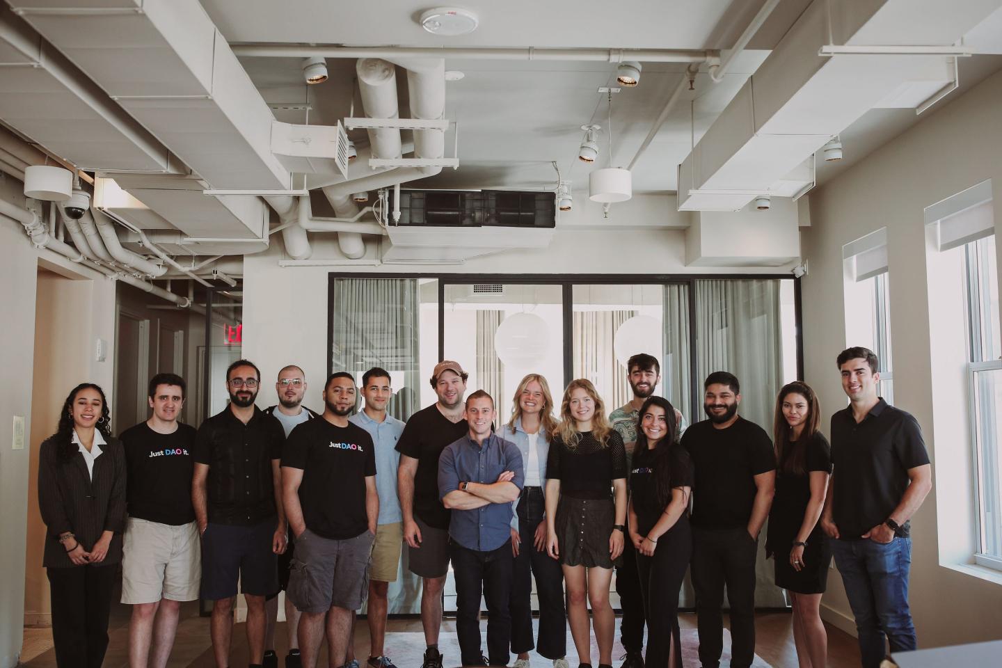Vault DAO employees pose for a group photo