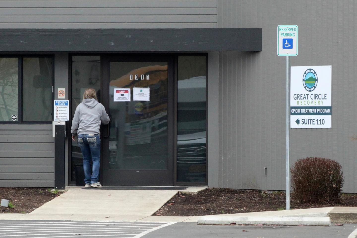 woman enters the Great Circle drug treatment center