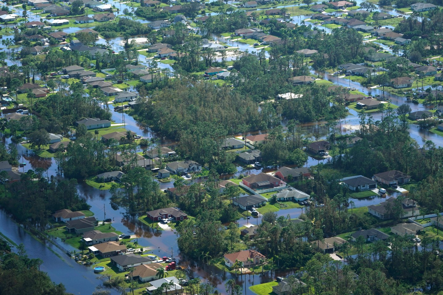 Homes are surrounded by flood waters caused by Hurricane Ian