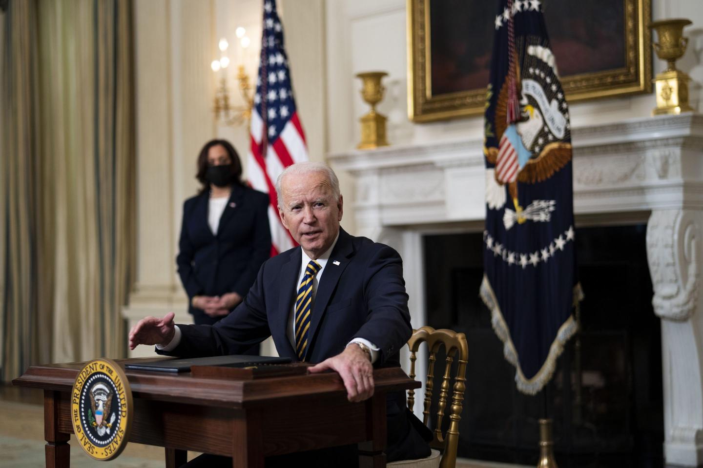 President Joe Biden signs executive order addressing semiconductors shortage in February.