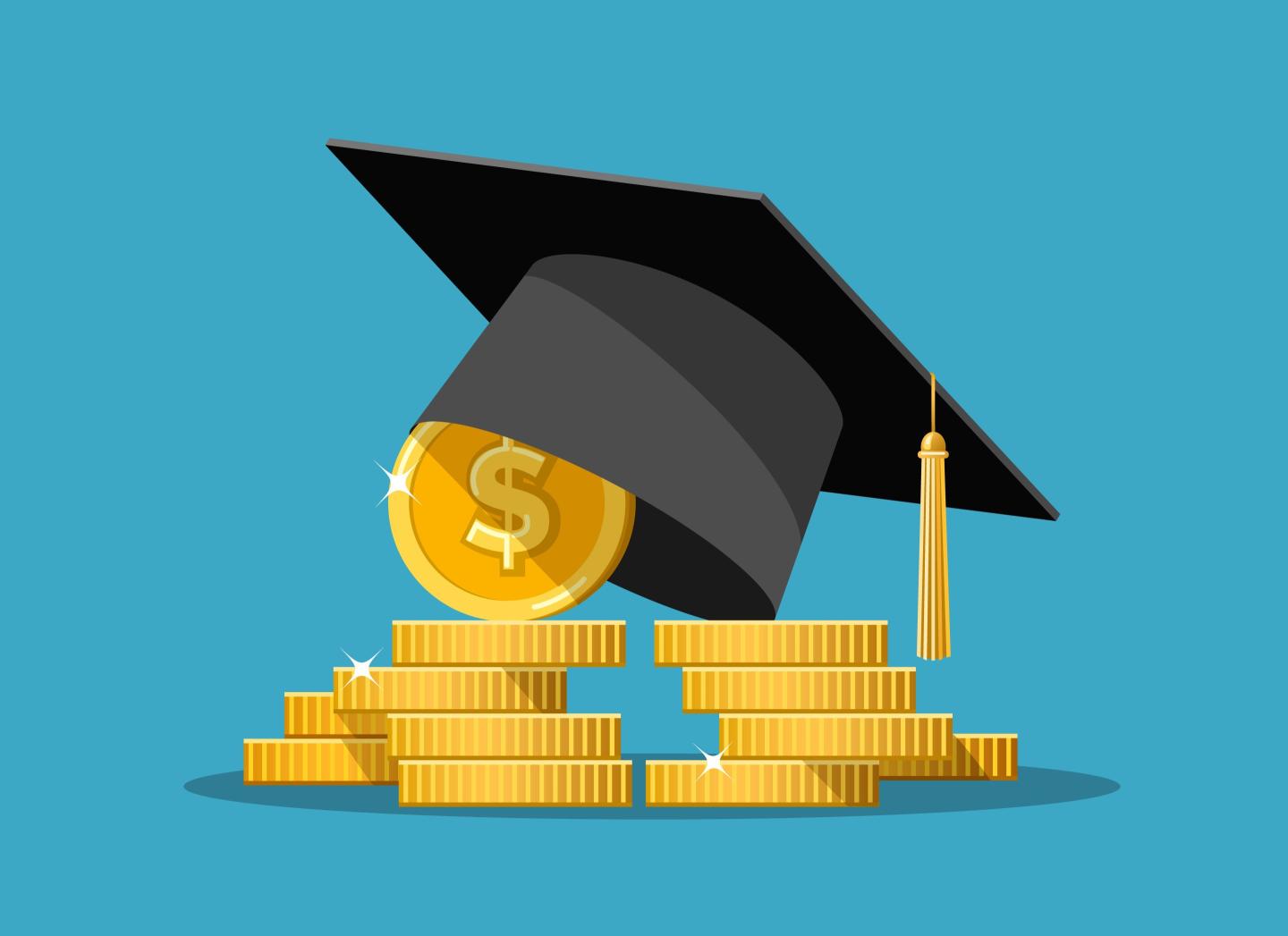 Graduation hat atop coins