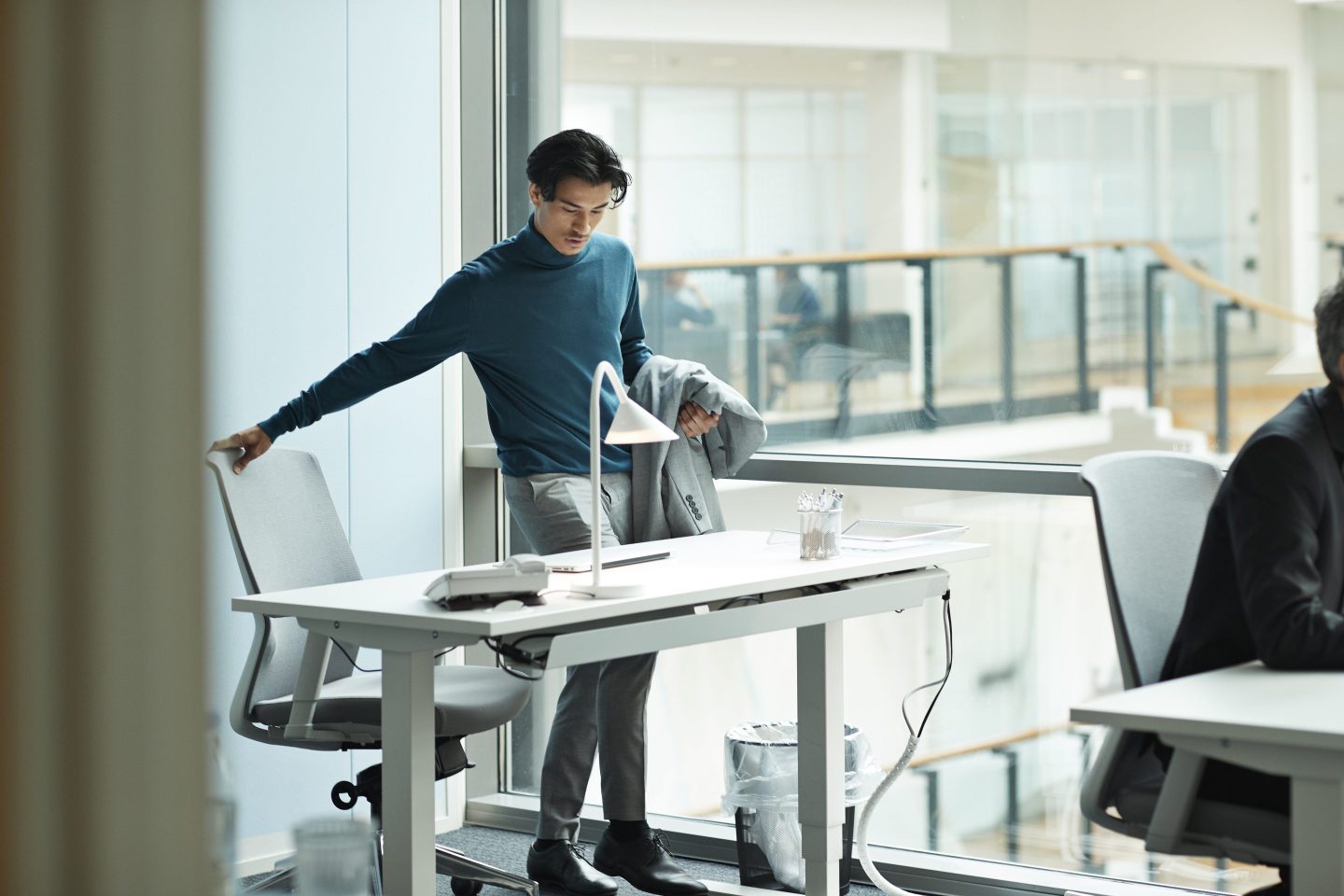 Worker arriving at office desk