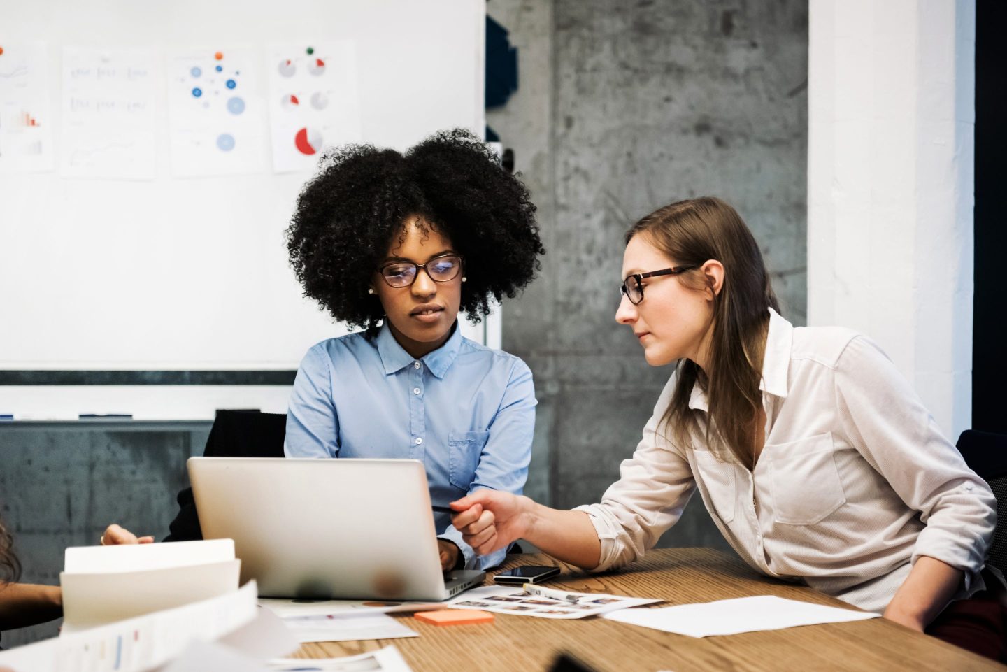 Colleagues working in conference room