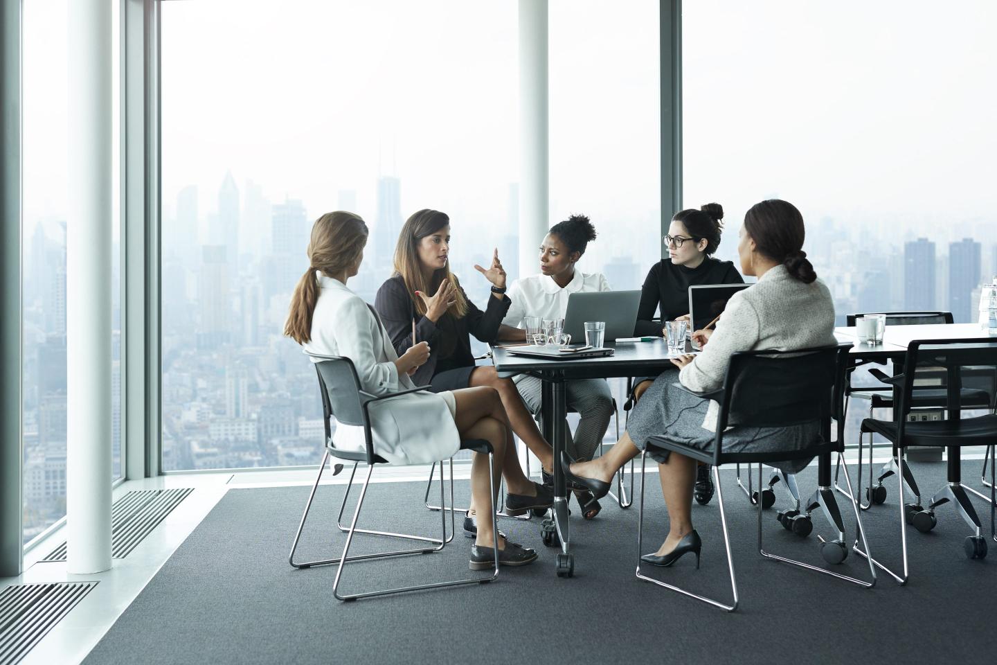Women in conference room meeting