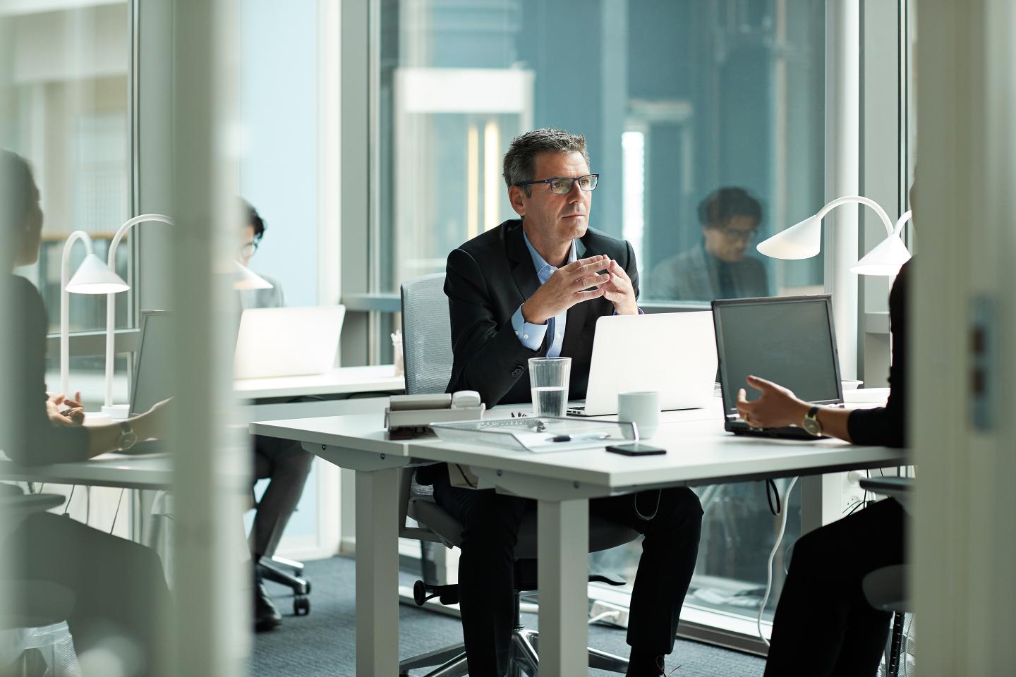 Businessman working in modern open office