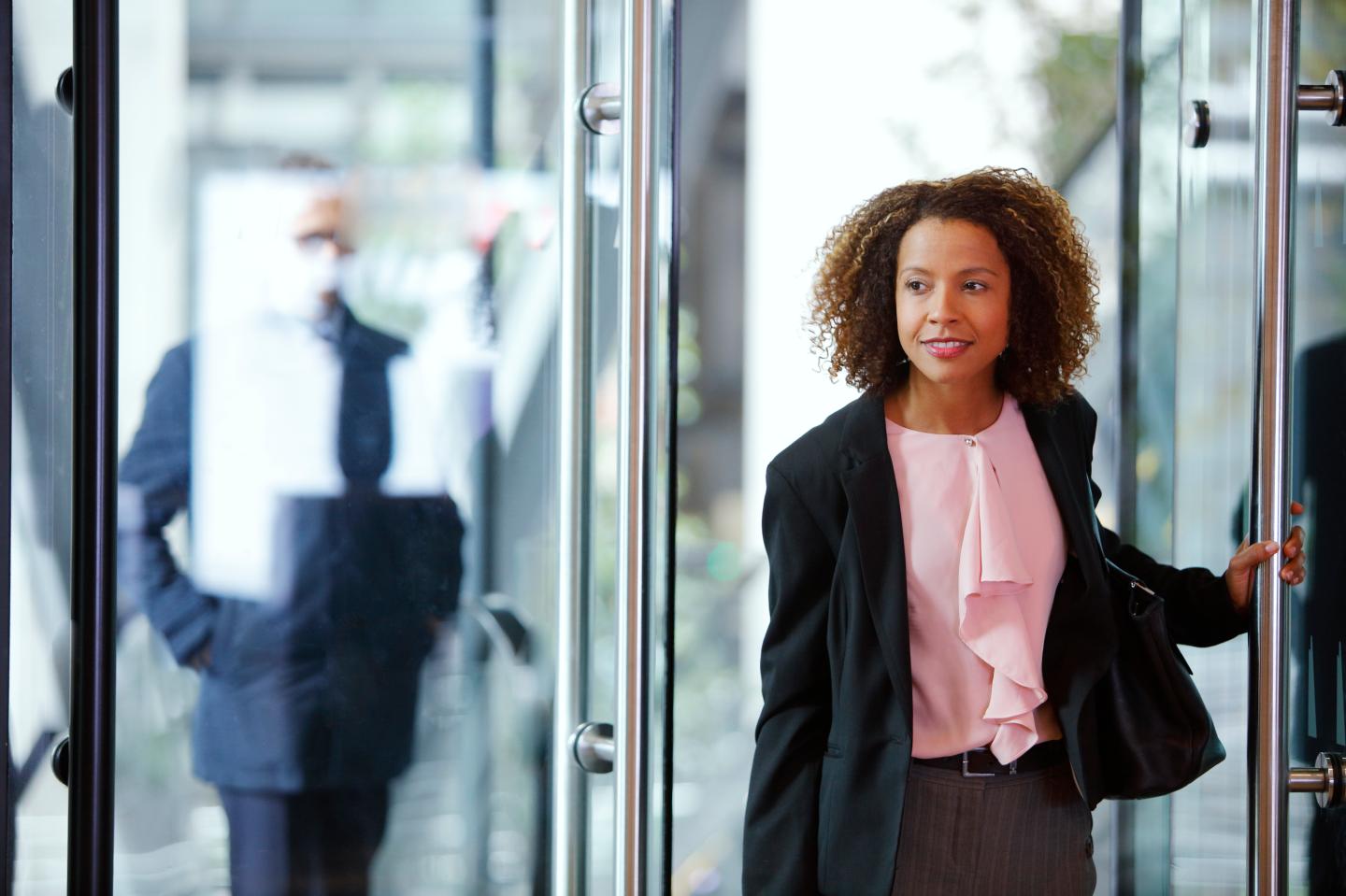 Businesswoman enters office