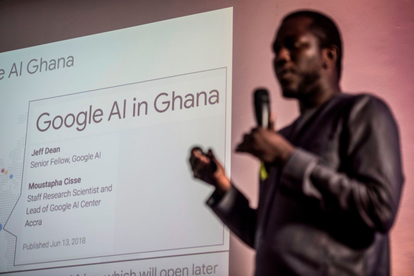 Photo of a speaker at a Google AI event in Ghana.