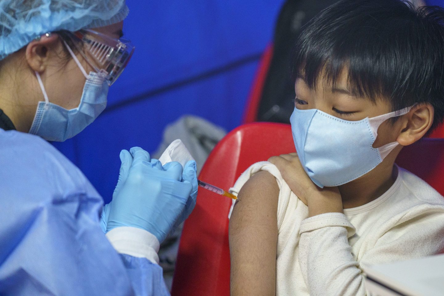 No Happy Meals or library trips for unvaccinated kids in Hong Kong, as the region tries to compel citizens to get COVID shots