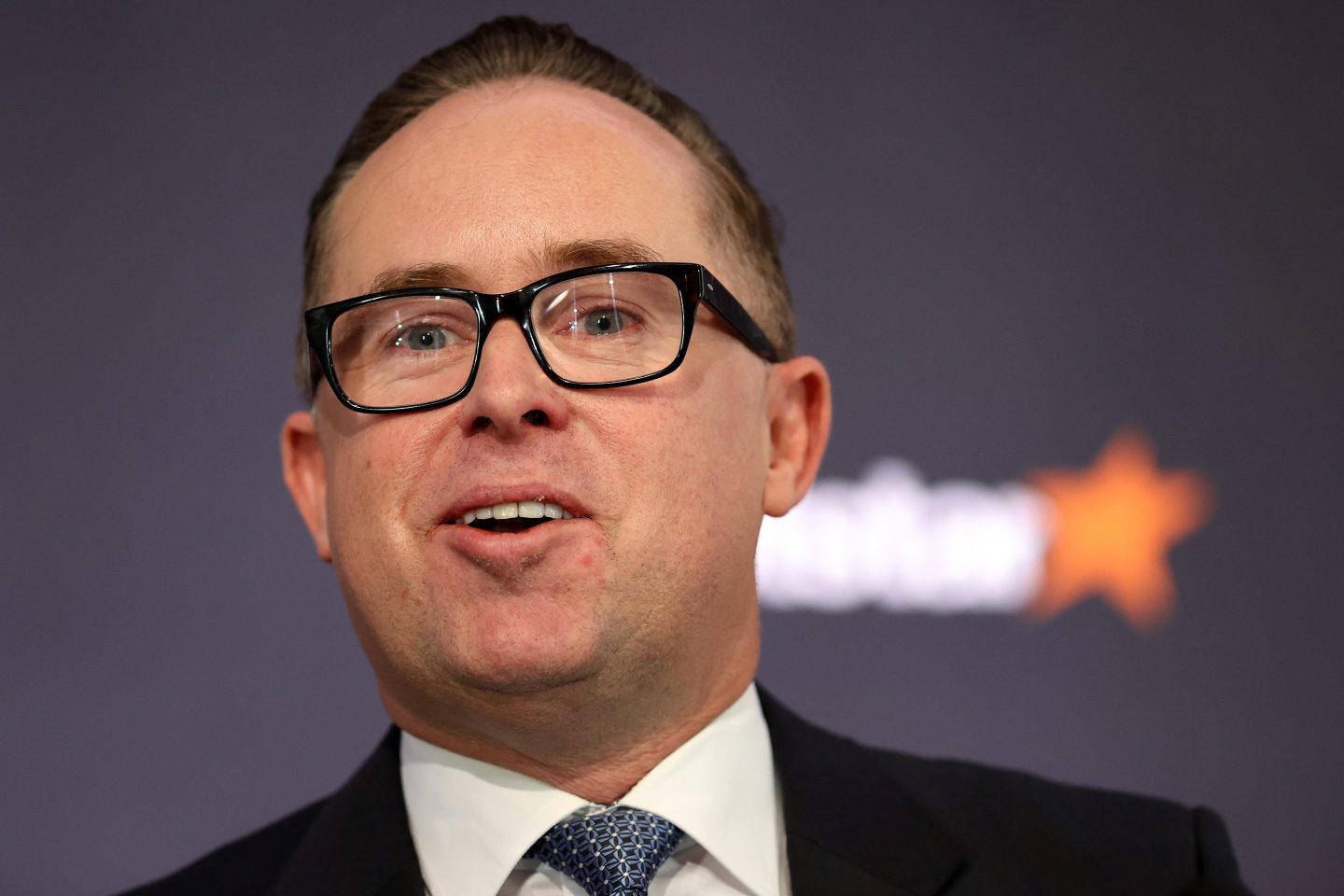 Alan Joyce, chief executive officer of Qantas Airways Ltd., speaks during a news conference in Sydney, Australia, on Thursday, Aug. 25, 2022. Qantas said travel has roared back, allowing it to cut debt and buy back shares, even as Australias flag airline posted its third consecutive annual loss.