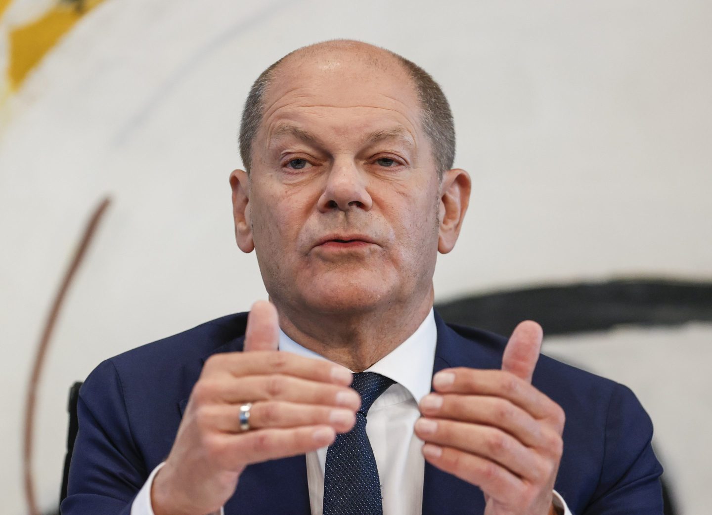 German Chancellor Olaf Scholz outlines the massive relief plan on Sunday.