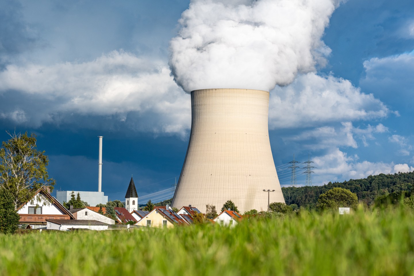 Water vapor rises from the cooling tower of the Isar 2 nuclear power plant in Germany