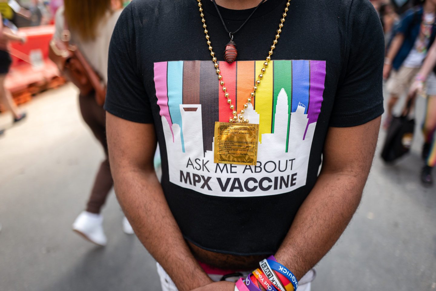 An employee of the Mecklenburg County Health Department wears a shirt encouraging people to ask him about the monkeypox vaccine at the 2022 Charlotte Pride Festival in North Carolina, Aug. 20, 2022.