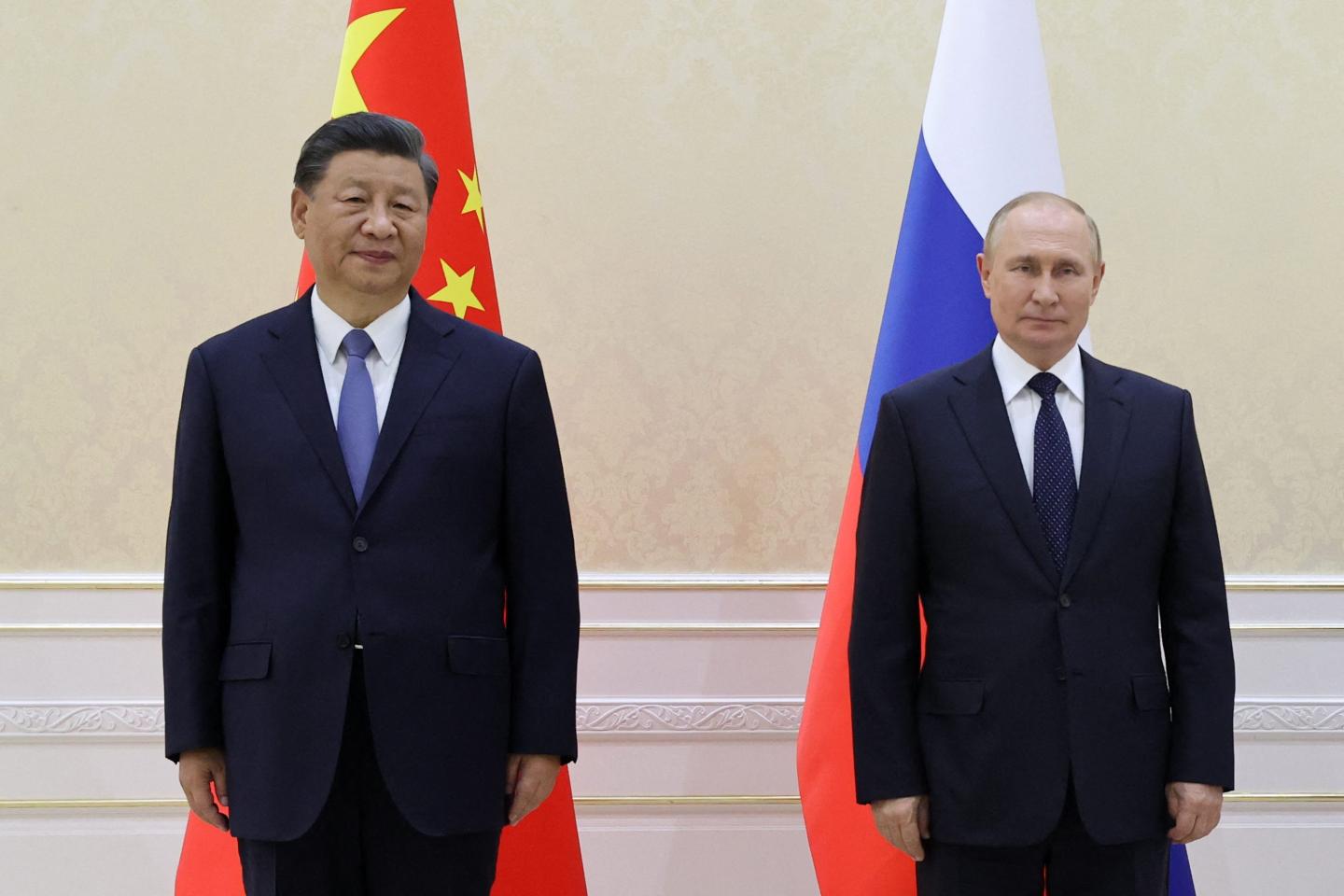 Chinese president Xi Jinping and Russian president Vladimir Putin pose for a photo during the SCO Summit in Samarkand, Uzbekistan, on September 15, 2022.