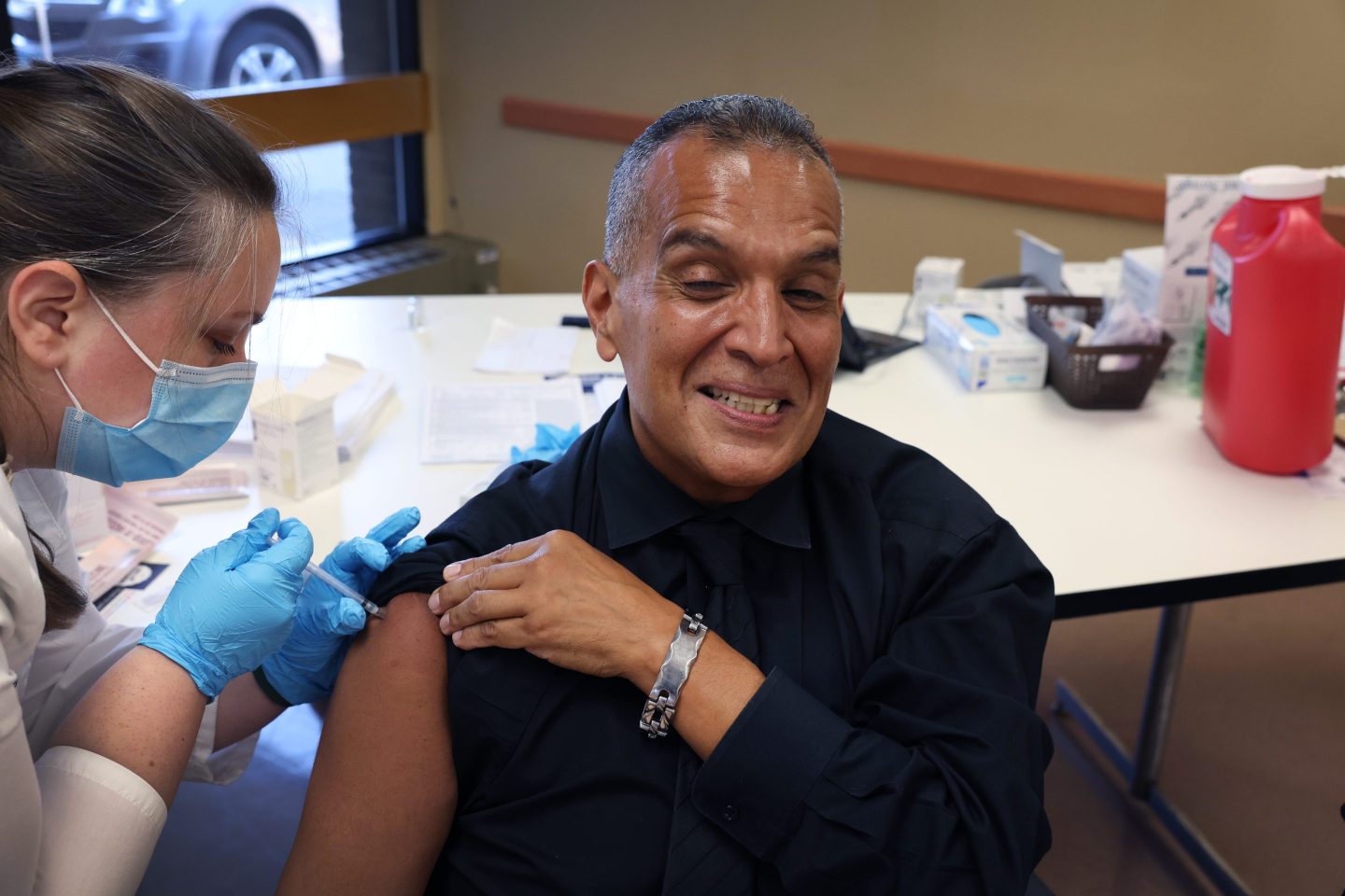 A man receives the updated "bivalent" COVID-19 booster vaccines in Chicago on September 9, 2022.