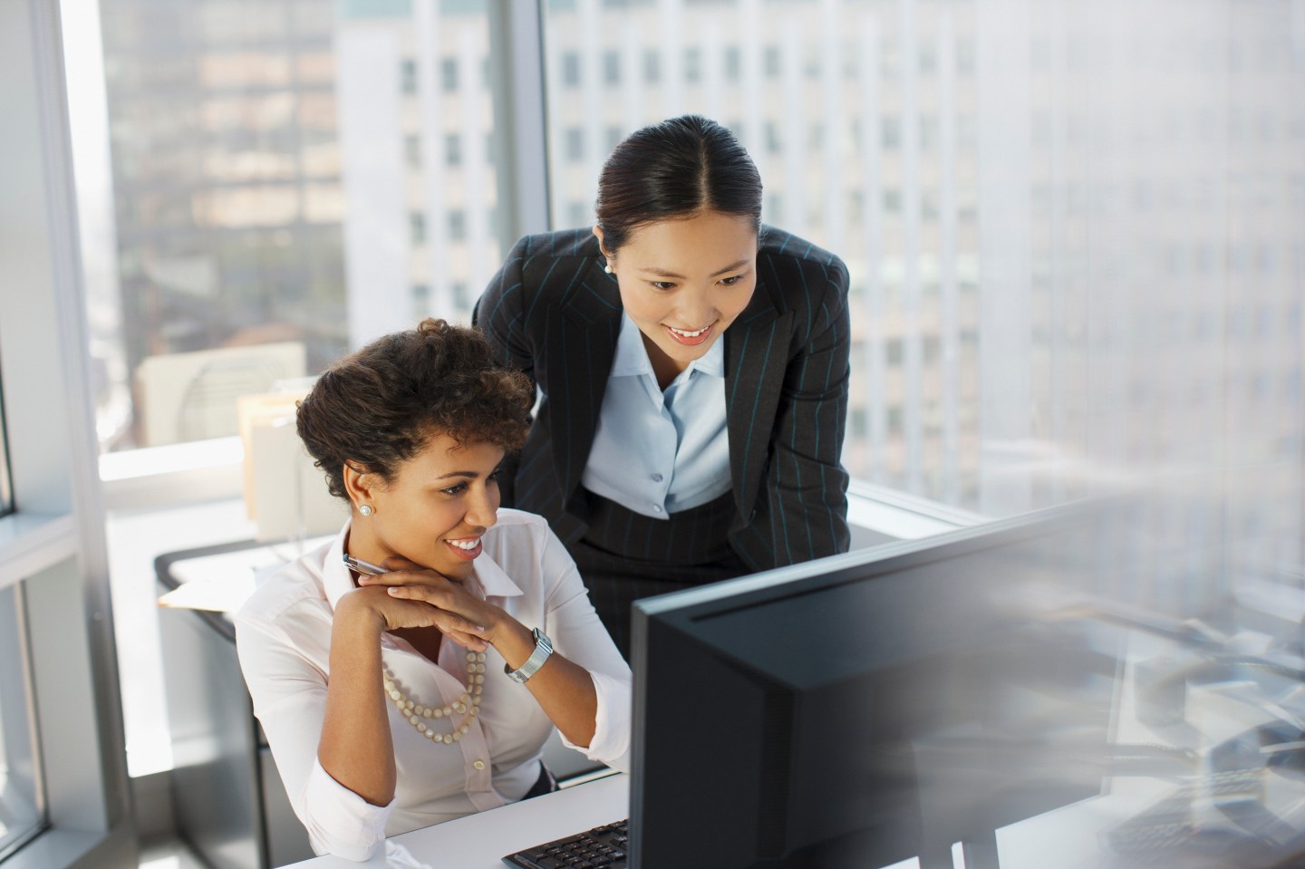 Businesswomen working together in office