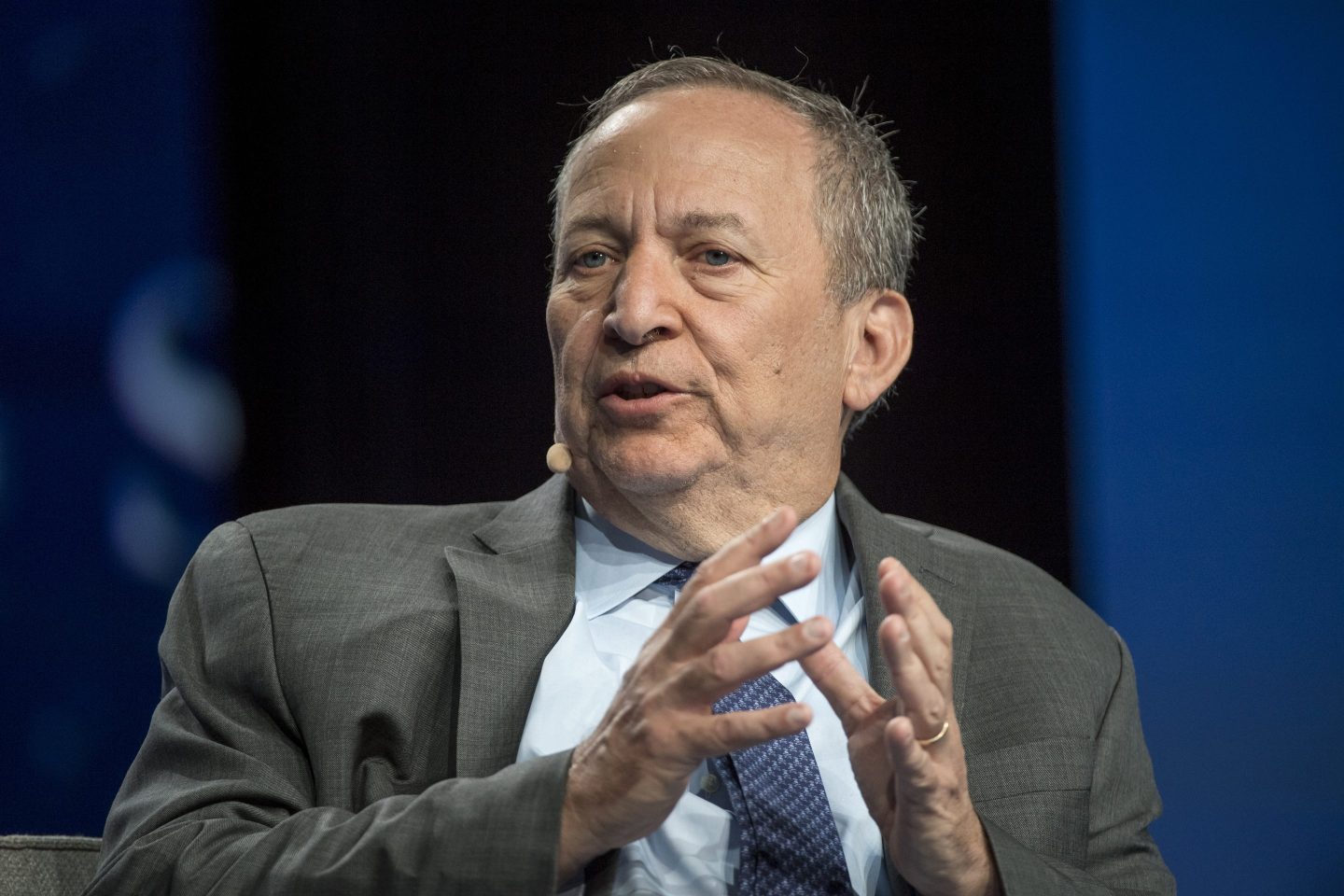 Portrait of former Treasury Secretary Larry Summers speaking at a conference.