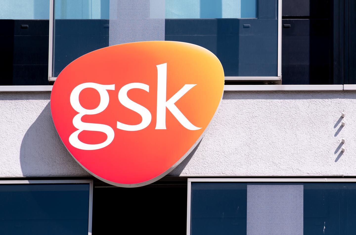 The logo of GSK at the company's offices.