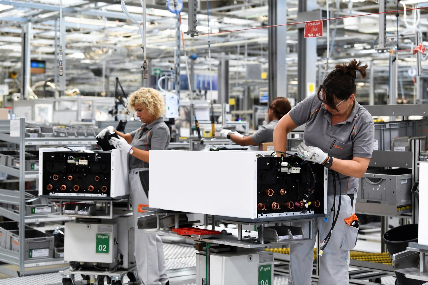Employees making heat pumps at the plant of German manufacturer Viessmann in Allendorf, Germany, August 9, 2022.