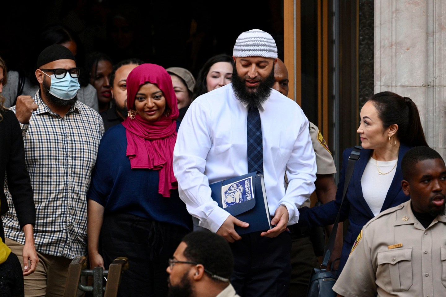 Adnan Syed leaving a courthouse