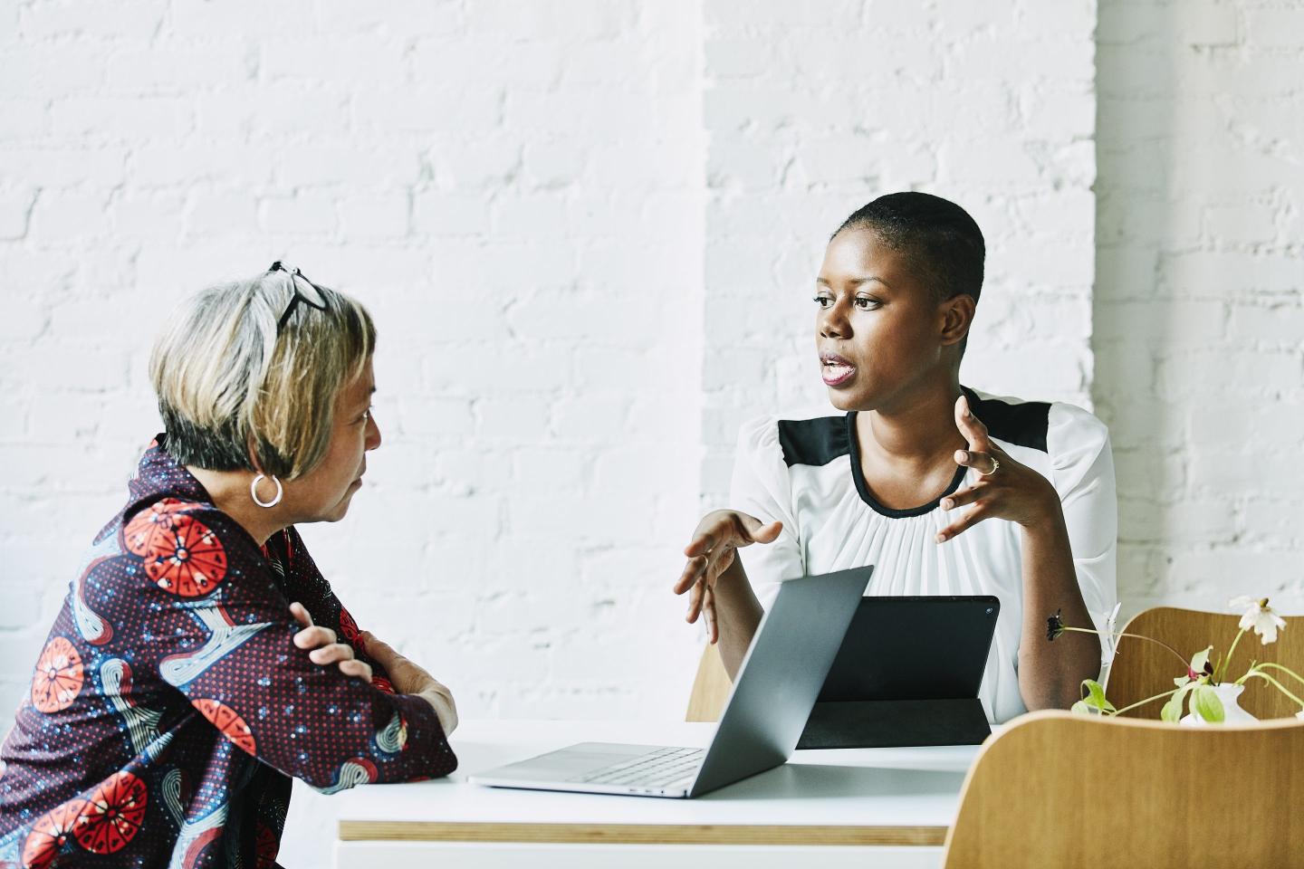 Financial adviser in discussion with client